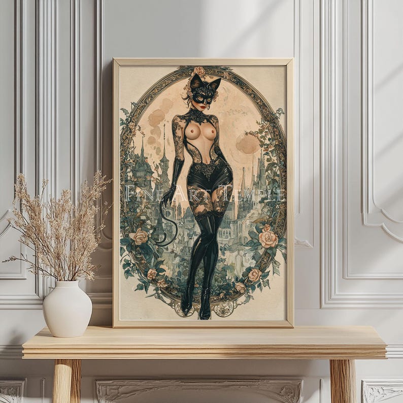 May include: A framed vintage-style print featuring a woman in a cat mask and costume, set against a backdrop of a city and floral elements. The artwork has a vintage aesthetic with soft colors and intricate details.