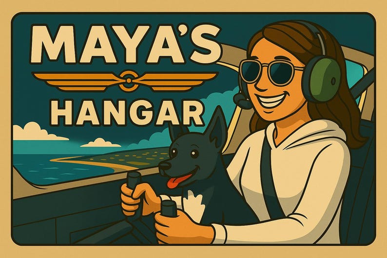 May include: Illustration of a woman and a dog in a cockpit, with the text "MAYA'S HANGAR". The woman wears sunglasses and a headset. The dog is black. The background shows a coastline and sky.