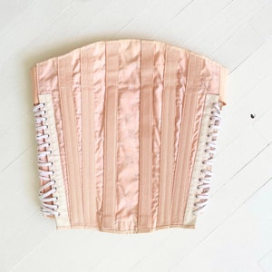 Reggiseno con cintura allacciata in jacquard rosa
