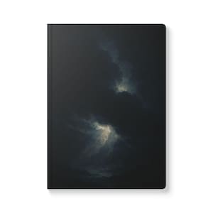May include: A black notebook with a dark, abstract design resembling clouds or smoke. The design features shades of gray and white against a black background. The notebook is rectangular and has a simple, clean design.
