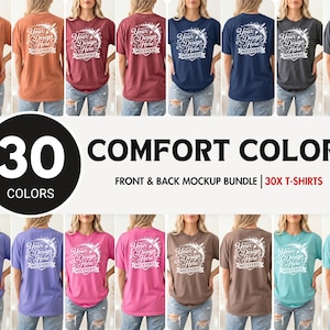 May include: A mockup bundle showcasing 30 comfort color t-shirts in various hues, including orange, maroon, navy, and teal. Each shirt displays a design on the front and back, with the text "Your Design Here" and "Mockverse".