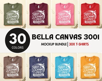 Può includere: Una collezione di magliette Bella Canvas 3001 in otto colori diversi, ognuna con una stampa grafica bianca che recita Your Design Here e MOCKVERSE con un'illustrazione di un pennello e schizzi di vernice.