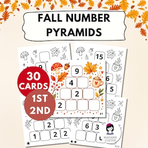 May include: A set of 30 educational cards titled FALL NUMBER PYRAMIDS featuring autumn-themed illustrations like mushrooms, acorns, leaves, and mugs. Each card displays a pyramid grid with empty boxes and numbers for math practice, accented with red circles stating 30 CARDS and 1ST 2ND.