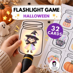 May include: A Halloween flashlight game set featuring 32 cards with illustrations of mason jars containing characters like a witch, pumpkins, and a cauldron. A black flashlight illuminates a card showing a witch in a rainbow dress and hat.