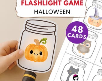 May include: A Halloween-themed flashlight game with a pumpkin jar design. The game includes 48 cards and features the text "Flashlight Game Halloween". The image shows a child holding a flashlight to illuminate a pumpkin-shaped card.