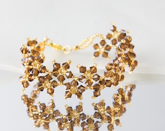 Pulsera de cristal Swarovski; pulsera de cristal; pulsera Swarovski multiflora con topacio ahumado, cadena ajustable de 18 cm y 5 cm -AA02