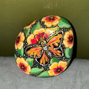 Hand Painted Butterfly and Flowers Art Rock. Painted using Acrylic including metallic and Glitter paints. Home Garden Collectable Decor.