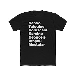 May include: Black t-shirt with white text listing planets: Naboo, Tatooine, Coruscant, Kamino, Geonosis, Utapau, and Mustafar. The shirt is made of a soft material and has a crew neck.