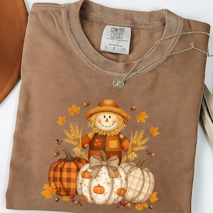 Pumpkin Scarecrow Fall T-Shirt, Autumn Harvest Graphic Tee, Comfort Colors® Thanksgiving Shirt, Rustic Plaid Pumpkin Top image 1