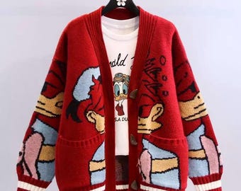 Character cardigan, oversized knit, button front, cozy graphic sweater