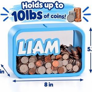 May include: A light blue rectangular piggy bank with a clear front panel and the name LIAM in white letters. The bank contains various metal coins and features dimensions of 8 inches wide, 5.75 inches high, and 3.7 inches deep, holding up to 10lbs of coins.