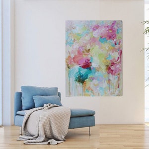 May include: Abstract painting with pink, blue, and yellow colors. The painting has a textured, layered look and features a drip effect.