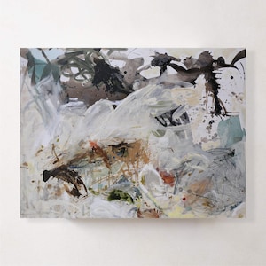 May include: Abstract painting with a mix of colors including white, brown, black, and touches of green and yellow. The artwork features a layered composition with brushstrokes and splatters, creating a textured effect. The painting is on a rectangular canvas.