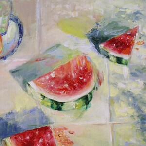 May include: An oil painting depicting three slices of bright red watermelon with green rinds, arranged on a light-coloured tiled surface. A small plate holding a glass of water and a round orange fruit is visible in the upper left corner.