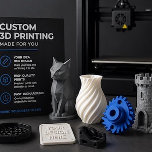 May include: A black sign reading CUSTOM 3D PRINTING MADE FOR YOU with various 3D printed objects including a gray geometric cat, a white spiral vase, a blue gear, a gray castle tower, a black hexagonal tray, and a white square tile with text.