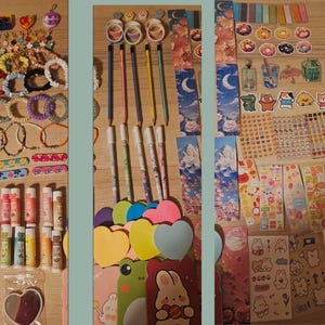 May include: A collection of colorful stationery and accessories, including bracelets, lip balms, pencils, stickers, and sticky notes. The items are arranged on a wooden surface, showcasing a variety of designs and patterns.