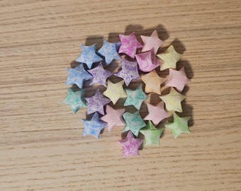 Glow in the dark paper stars. heart print