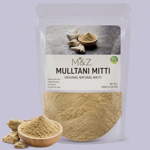 May include: A clear plastic pouch containing 100g (3.52 oz) of M&Z Mulltani Mitti powder. The label features the text M&Z Mulltani Mitti Original Natural Matti, Natural Skin Care, Deep Cleansing, Oil Control, For All Skin Types. A wooden bowl of powder sits in front.
