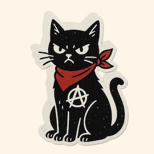 May include: A black cat sticker with an angry expression, wearing a red bandana. The cat has a white anarchy symbol on its chest. The sticker is on a cream-colored background. The cat is sitting upright.