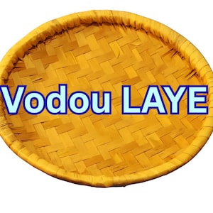 May include: A round, woven bamboo tray in a warm yellow hue. The tray features the text "Vodou LAYE" in blue letters. The design showcases a basket weave pattern, with a slightly raised edge.
