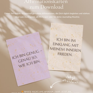 Könnte beinhalten: Zwei Affirmationskarten mit deutschem Text. Eine Karte ist lavendelfarben mit dem Text "ICH BIN GENUG - GENAU SO, WIE ICH BIN." Die andere ist cremefarben mit dem Text "ICH BIN IM EINKLANG MIT MEINEM INNEREN FRIEDEN."