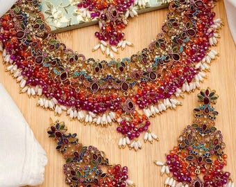 Nauratan gold plated necklace with earrings and tikka marron and green semi bridal sets