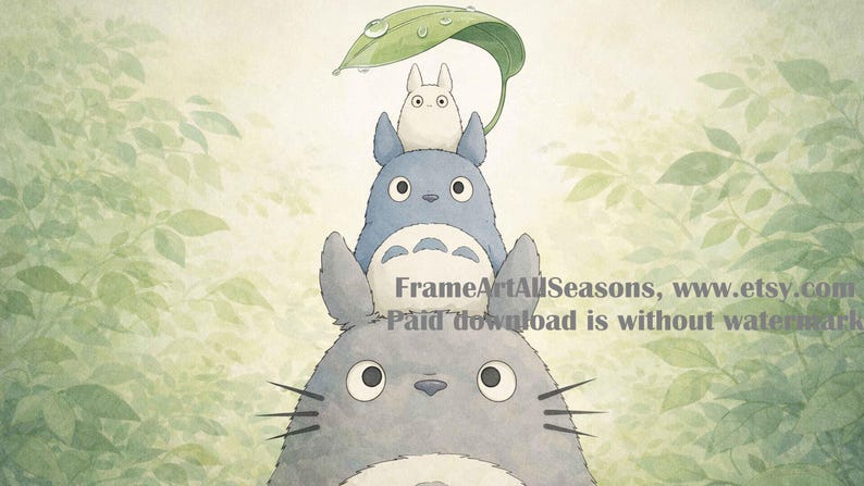 May include: Watercolor illustration of three Totoro characters stacked on top of each other, with a leaf overhead. The largest Totoro is gray, the middle one is blue, and the smallest is white. The background features green foliage.