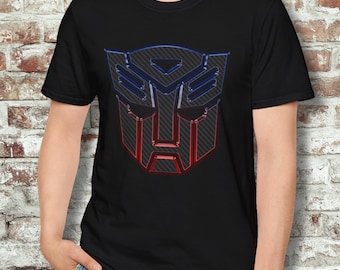 Camiseta con el logo de los Autobots en fibra de carbono, camiseta de Transformers, camiseta gráfica, camiseta geek, merchandising para fans, Optimus Prime, estilo años 80 y 90, toque moderno