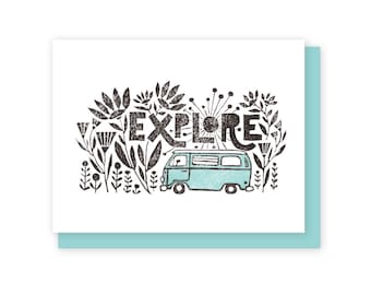 May include: A black and white illustration of a vintage van with the word "EXPLORE" in large letters. The van is surrounded by stylized flowers and plants.