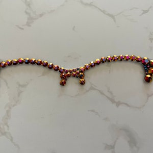 Black Rose Gold AB rhinestone on an Ella Topper