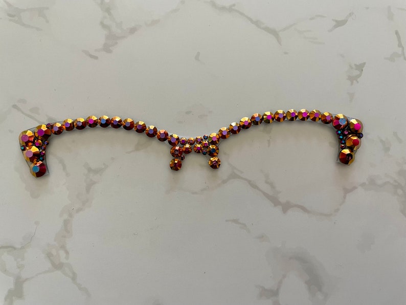 Black Rose Gold AB rhinestone on an Ella Topper