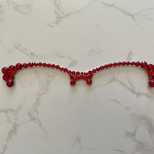 Red rhinestone on Ella topper