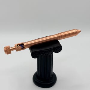 De originele handgemaakte koperen pen