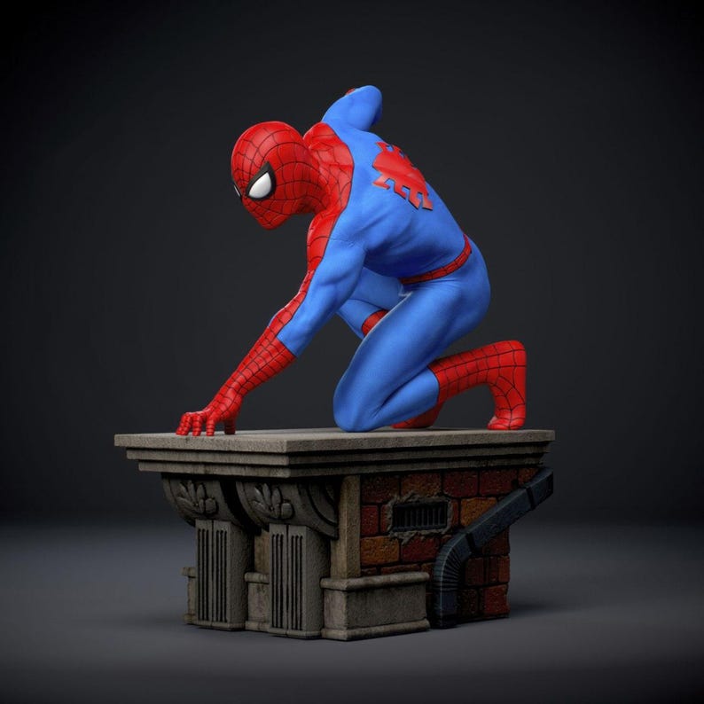 May include: A figurine of Spider-Man in a crouching pose, wearing his iconic red and blue suit. The figure is kneeling on a detailed rooftop structure made of brick and stone, with a dark background.