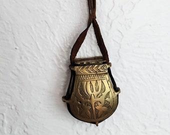 vintage Ottoman brass gun powder flask with leather strap, ornate design ~ GallivantsVintage