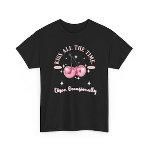 May include: Black t-shirt featuring a graphic of two pink disco ball cherries with the text "Kiss All The Time" and "Disco. Occasionally."