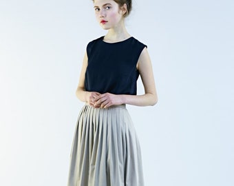 Beige rok, midi-rok, volledige rok, plooirok, zakrok, uitlopende rok, kantoorrok, rok jaren 1950, cocktailrok, bruidsrok