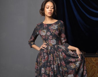 Long black floral print dress with open back & and pockets in retro style by Mrspomeranz