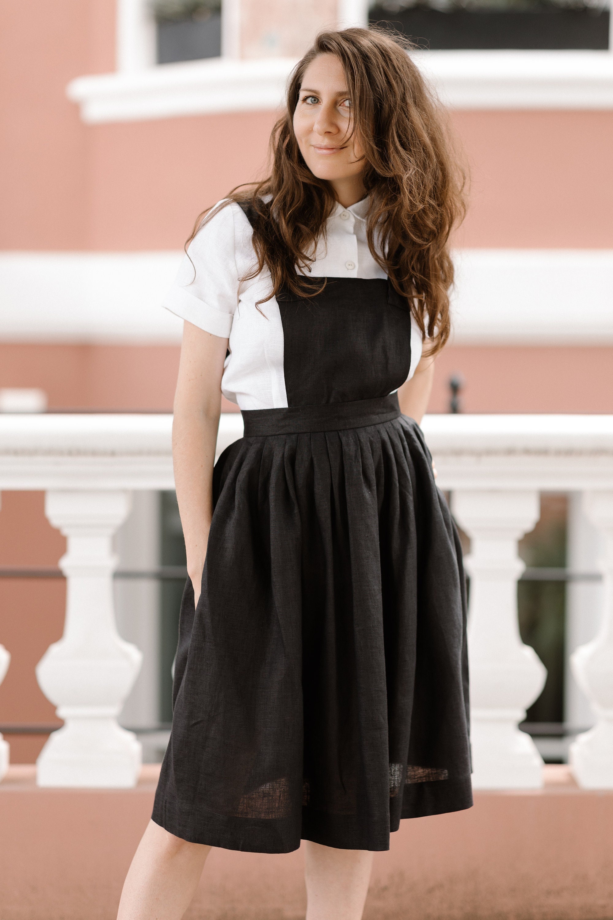 black pinafore dress