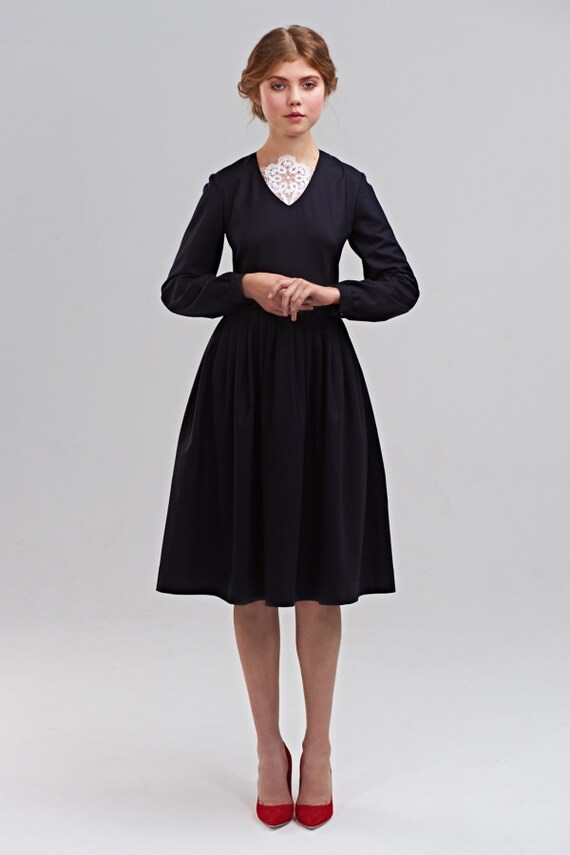 Black cocktail dress with pockets discount