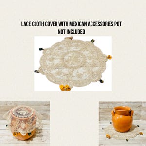 May include: A beige lace cloth cover with a floral design and decorative accents. The text on the image reads: LACE CLOTH COVER WITH MEXICAN ACCESSORIES POT NOT INCLUDED. The cover is shown with a terracotta pot.