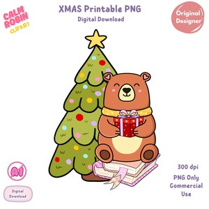 May include: A digital Christmas-themed PNG featuring a cartoon bear holding a gift, sitting on books, with a decorated Christmas tree. The bear wears a yellow scarf. The image includes the text "XMAS Printable PNG" and "Digital Download".