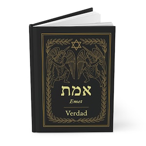 May include: A black hardcover book with gold foil accents. The cover features an illustration of two angels with swords, a Star of David, and the Hebrew word "Emet" with the English translation "Truth" and the Spanish translation "Verdad".