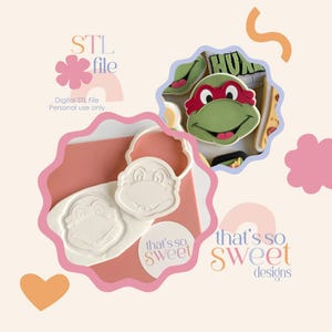 May include: Image features a Teenage Mutant Ninja Turtle cookie and cookie cutter. The cookie is green with a red mask. The cutter is white. Text includes "STL file" and "that's so sweet designs."