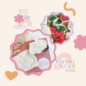 May include: An image featuring strawberry-themed cookie cutters, cookies, and a stamp. The cookies are decorated with red strawberries and green leaves. The image also includes the text "STL file" and "that's so sweet designs."