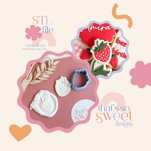 May include: Image of strawberry-themed cookies and cookie cutters. The cookies are decorated with red, white, and green icing. The image also includes a blue strawberry-shaped cookie cutter, a white embossed strawberry, and the text "STL file".