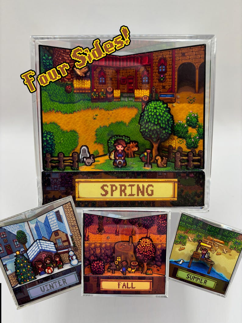 May include: A clear acrylic display featuring a diorama of a video game scene, with the text "Four Sides!" in a yellow font. The main display shows a spring scene, with smaller displays for winter, fall, and summer.
