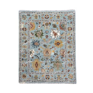 Handgeknüpfter orientalischer Teppich aus Wolle mit floralen Motiven - Handgeknüpfter orientalischer Teppich aus Wolle mit floralen Motiven