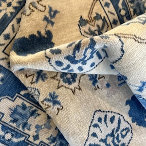 Ivory and Blue Oushak Rug 8x10 – Hand Knotted Wool Turkish Area Carpet with Navy Floral Pattern for Living Room or Bedroom Décor.