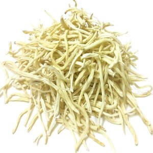May include: A pile of dried, pale yellow lily buds. The buds are long, thin, and slightly curved, with a fibrous texture. The background is plain white, highlighting the natural color and form of the dried product.